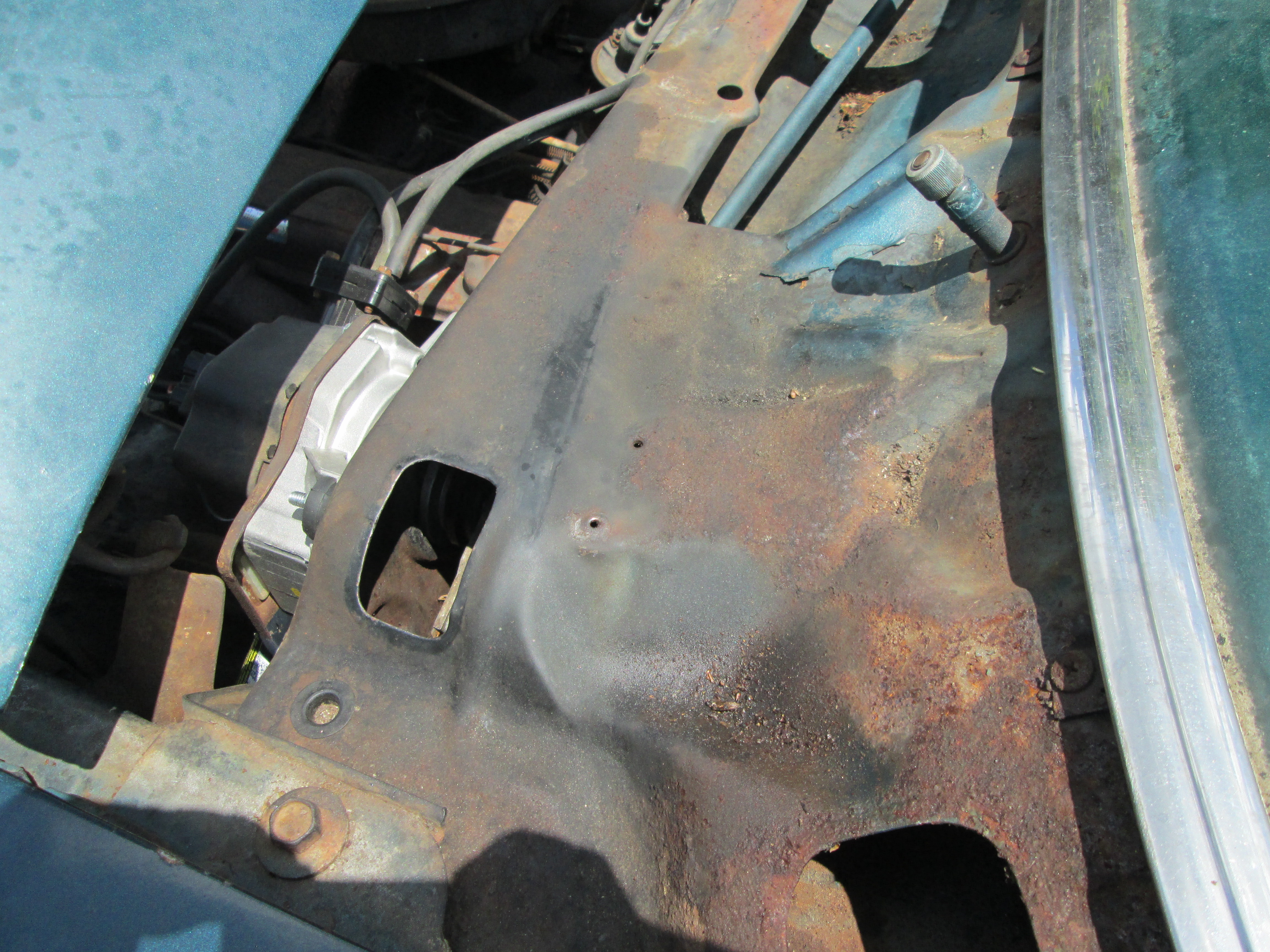 That access hole is the only way to connect the wiper control arms to the motor. Also, lots of old metal here, will be sanding it all down and getting it painted